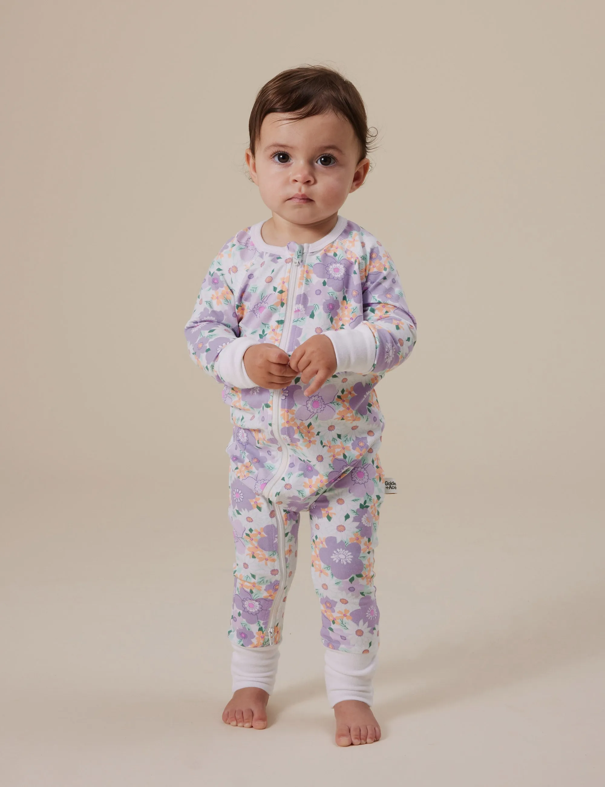 Goldie   Ace Flora Zipsuit